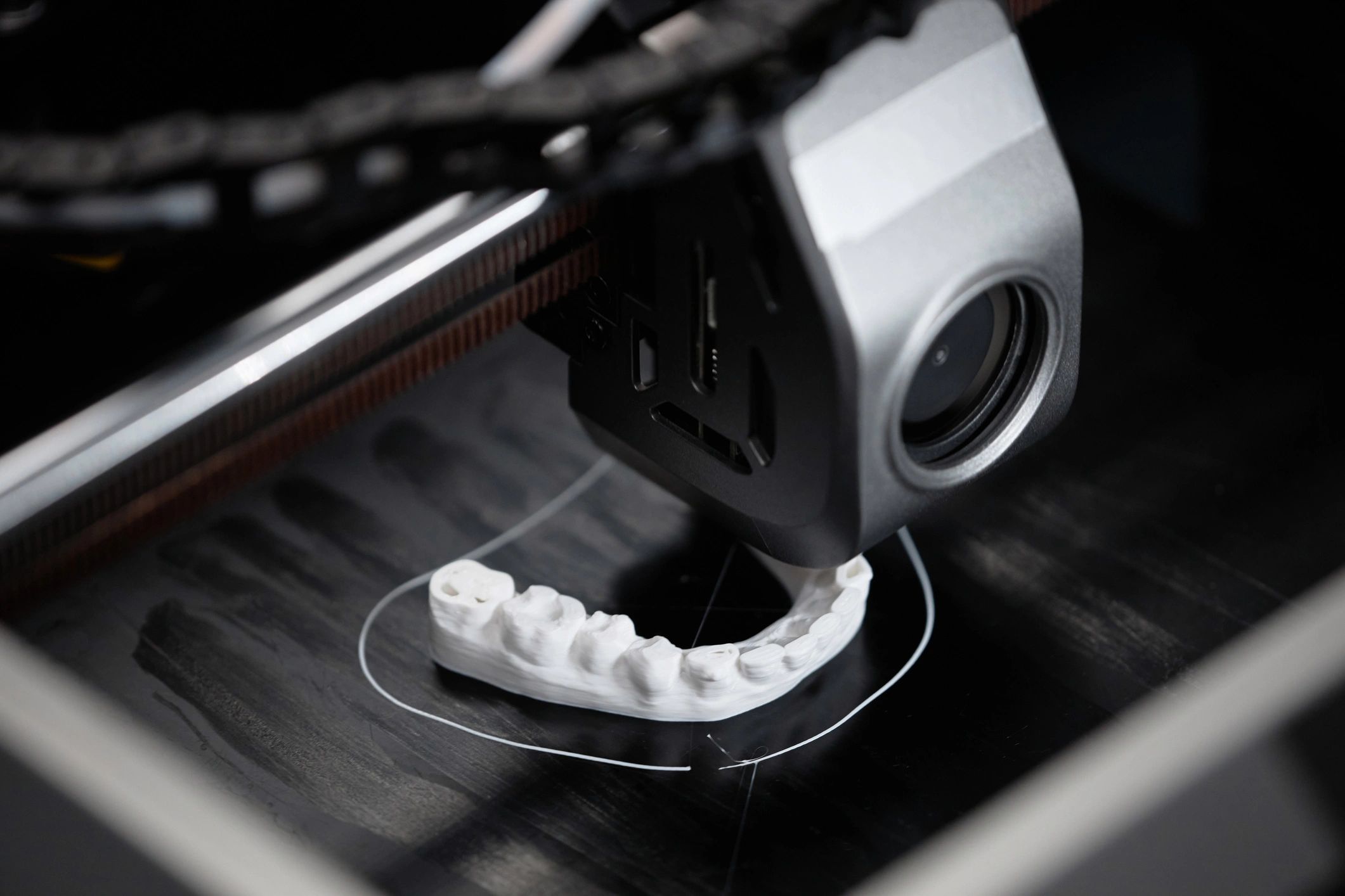 3D printer creating a model used as a neutral testimonial avatar image