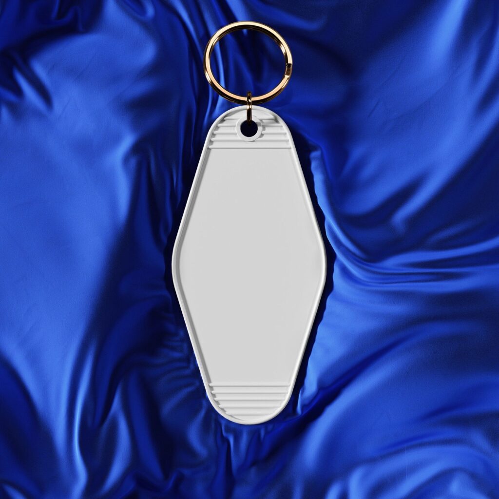 Customizable 3D-printed name keychain on a clean neutral background